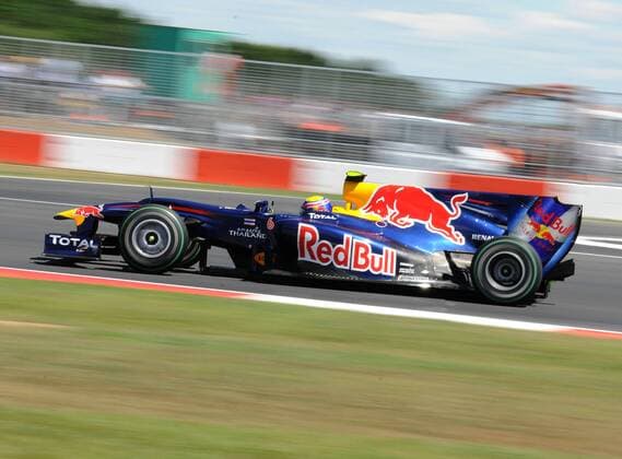 Red Bull s Australian driver Mark Webber competes during the Formula One British Grand Prix at the Silverstone circuit July 11, 2010. Webber won the champion with 1 hour 24 minutes and 38.200 seconds. 