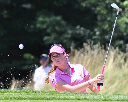 Paula Creamer (USA) watches the ball as she hits out of a bunker on the sixth hole and saves par during the final round of the USGA 2010 U.S. Women s Open at Oakmont Country Club in Oakmont, Pennsylvania on July 11, 2010.  PIT2010071108