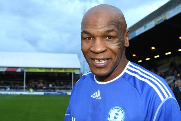 Peterborough United v West Ham United - Pre-season friendly. . 14.07.10 Boxing legend Mike Tyson at London Road, home of Peterborough United, in a Peterborough Jersey 