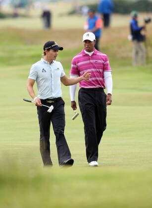 Golf- St Andrews - The Open Championship: Camilo Villegas of Colombia (L) and Tiger Woods of USA during the first round of The Open Championship at St Andrews 15th July 2010 