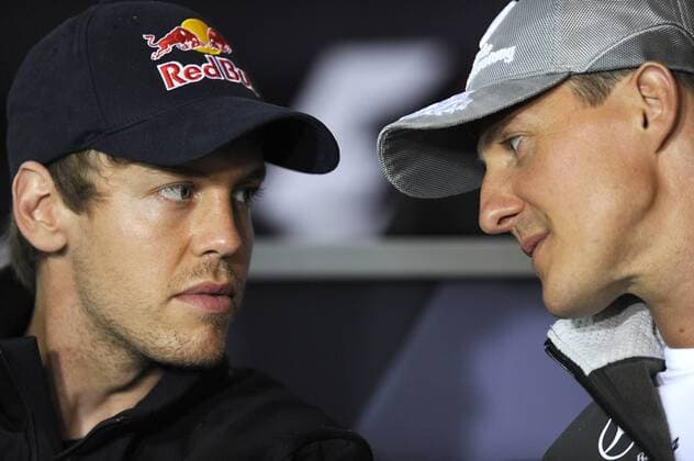 Sebastian VETTEL (GER, L), Red Bull Racing und Michael SCHUMACHER (GER), MercedesGP Petronas - Formel 1 GP von Deutschland am Hockenheimring