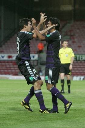 Football - UEFA Champions League 3rd Qualifying Round - The New Saints FC (white green) vs. RSC Anderlecht (blue black) --- Anderlecht s Matias Suarez (R) celebrates scoring his sides 3rd goal at the Racecourse Ground, Wrexham 