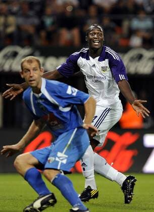 ANDERLECHT , 03 08 2010 FOOTBALL CHAMPIONS LEAGUE QUALIFICATION RSC Anderlecht (White) vs The New Saints of Oswestry and Llansantffraid FC (Blue): ROMELU LUKAKU r. STEVEN EVANS 