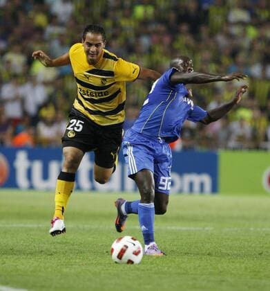UEFA champions league qualifying match between Fenerbahce Istanbul and BSC Young Boys Bern at Sukru Saracoglu Stadium in Istanbul - Young Boys won scored 0 :1 - Ammar Jemal (L) of Young Boys and Issiar Dia (R) of Fenerbahce. 