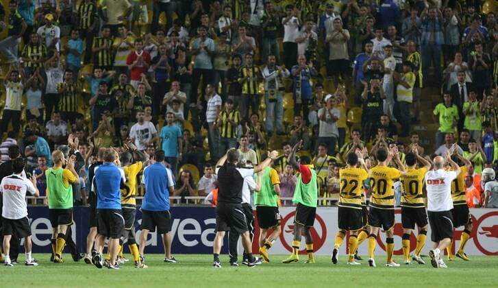 UEFA champions league qualifying match between Fenerbahce Istanbul and BSC Young Boys Bern at Sukru Saracoglu Stadium in Istanbul - Young Boys celebrate the victory in front of the Fenerbahce fans - 