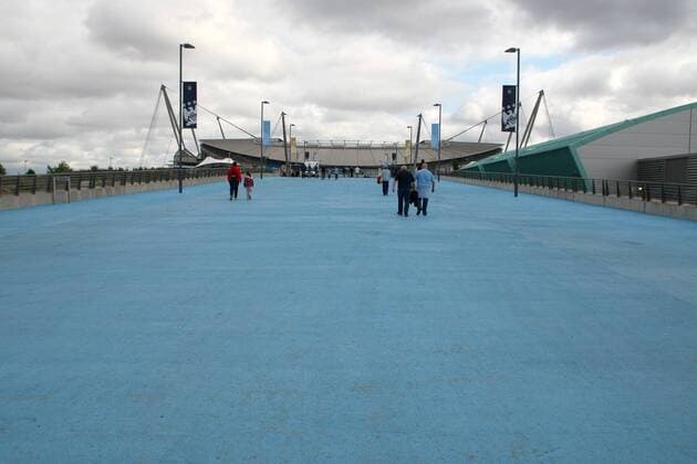 Football - Pre-season friendly: Manchester City, Joe Mercer way in it s new blue colour scheme at the City of Manchester Stadium, Manchester  o0 Fan, Fußballfan, Publikum