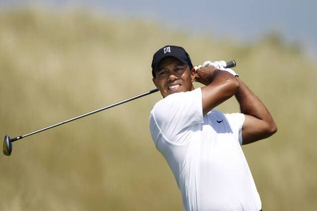 Tiger Woods (USA) follows through on his tee shot on the 14th hole during the first round of the 92nd PGA Championship at Whistling Straits in Kohler, Wisconsin on August 12, 2010. Woods finished his round with a 1-under-par 71.  BKX2010081204