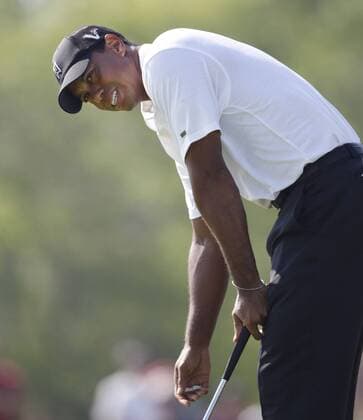 Tiger Woods (USA) reacts after missing a birdie putt on the 6th hole during the first round of the 92nd PGA Championship at Whistling Straits in Kohler, Wisconsin on August 12, 2010. Woods finished his round with a 1-under-par 71.  BKX2010081207