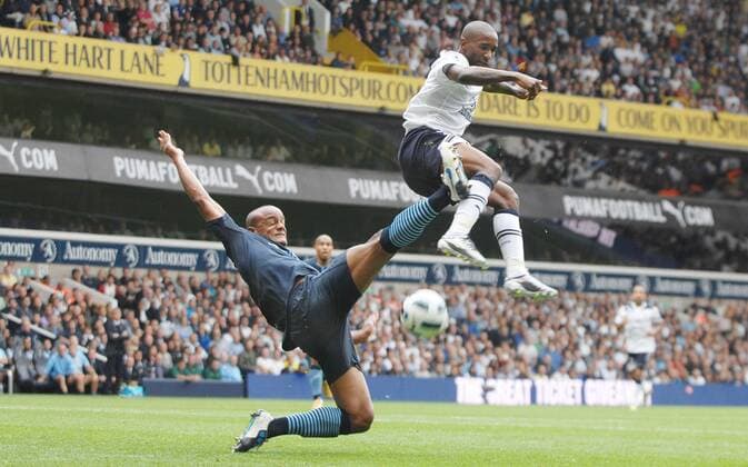 Football - Jermain Defoe (Tott, R) Vincent Kompany (City) . Tottenham Hotspur v Manchester City 14 08 2010 