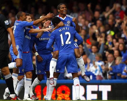 Florent Malouda (up) of Chelsea celebrates scoring his side s first goal - Barclays Premier League, FC Chelsea vs. West Bromwich Albion 14th August, 2010 EDITORIAL USE ONLY. No use with unauthorised audio, video, data, fixture lists, club league logos or live services. Online in-match use limited to 120 images, no video emulation. No use in betting, games or single club league player publications. o0 Jubel Freude