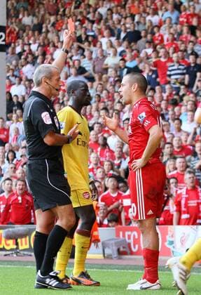 Liverpool FC s Joe Cole (R) gets sent off for this late tackle on Arsenal s Laurent Koscielny Barclays Premier League Liverpool v Arsenal 15th August, 2010 EDITORIAL USE ONLY. No use with unauthorised audio, video, data, fixture lists, club league logos or live services. Online in-match use limited to 120 images, no video emulation. No use in betting, games or single club league player publications. o0 Platzverweis, London Arsenal