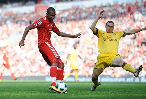 Barclays Premier League - Liverpool vs. Arsenal Liverpool s David N Gog (L) scores early in the second half at Anfield in Liverpool  o0 Ngog Tor