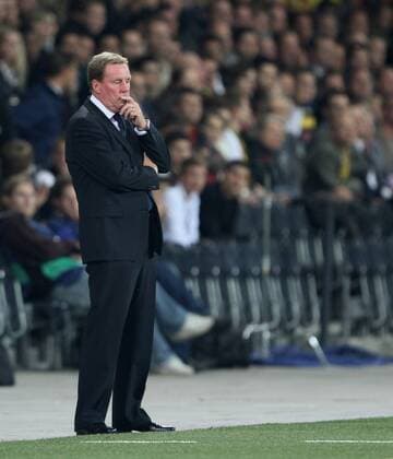 Tottenham s coach Harry Redknapp looks on dejected UEFA Champions League Qualifying Young Boys Bern (yellow) v Tottenham Hotspur (white) 17th August, 2010 EDITORIAL USE ONLY. No use with unauthorised audio, video, data, fixture lists, club league logos or live services. Online in-match use limited to 120 images, no video emulation. No use in betting, games or single club league player publications.