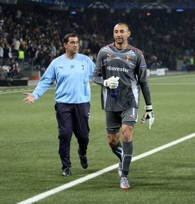 Tottenham s goalkeeping coach Tony Parks (L) has stern words with Heurelho Gomes at half time UEFA Champions League Qualifying Young Boys Bern (yellow) v Tottenham Hotspur (white) 17th August, 2010 EDITORIAL USE ONLY. No use with unauthorised audio, video, data, fixture lists, club league logos or live services. Online in-match use limited to 120 images, no video emulation. No use in betting, games or single club league player publications.