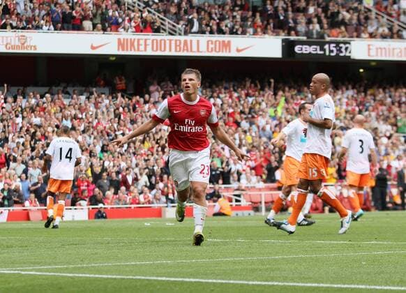 Arsenal s Anderi Arshavin celebrates scoring his sides second goal Barclays Premier League Arsenal London (red) v Blackpool FC (white) 21st August, 2010 EDITORIAL USE ONLY. No use with unauthorised audio, video, data, fixture lists, club league logos or live services. Online in-match use limited to 120 images, no video emulation. No use in betting, games or single club league player publications. o0 Jubel Freude