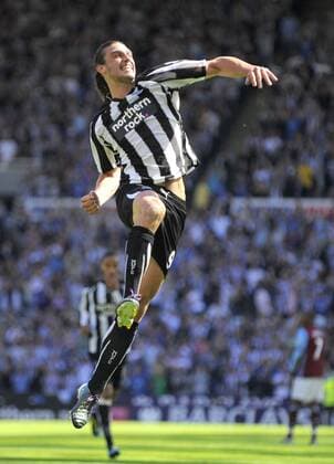 Newcastle s Andy Carroll celebrates scoring his side s third goal. Barclays Premier League Newcastle United v Aston Villa 22nd August, 2010 EDITORIAL USE ONLY. No use with unauthorised audio, video, data, fixture lists, club league logos or live services. Online in-match use limited to 120 images, no video emulation. No use in betting, games or single club league player publications.