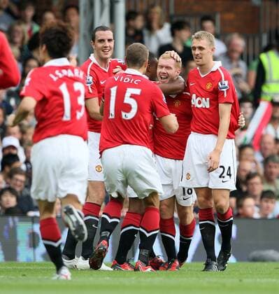 Manchester United s Paul Scholes (2.R) celebrates scoring his sides opening goal - Barclays Premier League Fulham FC (white) v Manchester United ManU (red) 22nd August, 2010 EDITORIAL USE ONLY. No use with unauthorised audio, video, data, fixture lists, club league logos or live services. Online in-match use limited to 120 images, no video emulation. No use in betting, games or single club league player publications.
