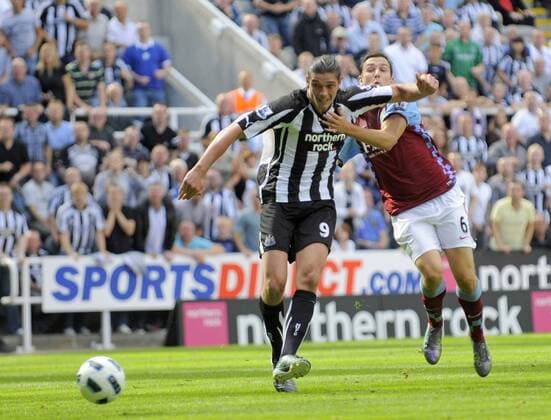 Newcastle s Andy Carroll scores his side s sixth goal and his third. - Barclays Premier League Newcastle United (black) v Aston Villa (red) 22nd August, 2010 EDITORIAL USE ONLY. No use with unauthorised audio, video, data, fixture lists, club league logos or live services. Online in-match use limited to 120 images, no video emulation. No use in betting, games or single club league player publications.