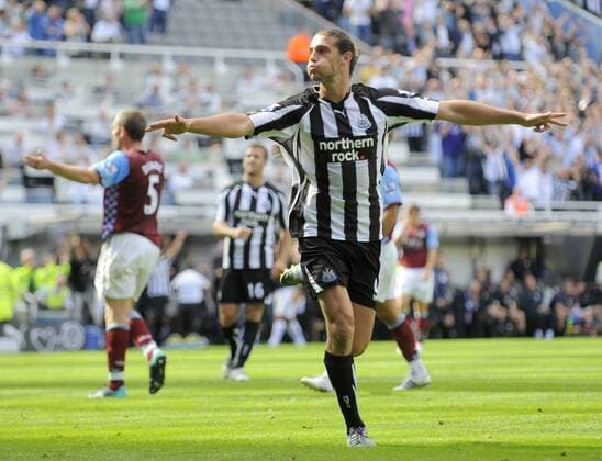Newcastle s Andy Carroll celebrates scoring his side s sixth goal and his third. - Barclays Premier League Newcastle United (black) v Aston Villa (red) 22nd August, 2010 EDITORIAL USE ONLY. No use with unauthorised audio, video, data, fixture lists, club league logos or live services. Online in-match use limited to 120 images, no video emulation. No use in betting, games or single club league player publications.