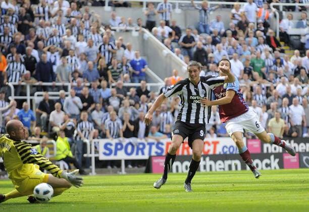 Newcastle s Andy Carroll scores his side s sixth goal. - Barclays Premier League Newcastle United (black) v Aston Villa (red) 22nd August, 2010 EDITORIAL USE ONLY. No use with unauthorised audio, video, data, fixture lists, club league logos or live services. Online in-match use limited to 120 images, no video emulation. No use in betting, games or single club league player publications.