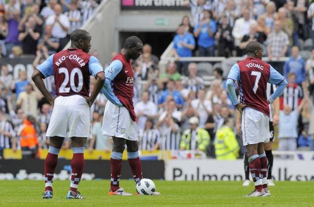 Aston Villa players with Ashley Young (R) look dejected after conceding six goals to Newcastle United. - Barclays Premier League Newcastle United (black) v Aston Villa (red) 22nd August, 2010 EDITORIAL USE ONLY. No use with unauthorised audio, video, data, fixture lists, club league logos or live services. Online in-match use limited to 120 images, no video emulation. No use in betting, games or single club league player publications.