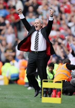 Fulham s coach Mark Hughes celebrates his sides late equaliser - Barclays Premier League Fulham FC (white) v Manchester United ManU (red) 22nd August, 2010 EDITORIAL USE ONLY. No use with unauthorised audio, video, data, fixture lists, club league logos or live services. Online in-match use limited to 120 images, no video emulation. No use in betting, games or single club league player publications.