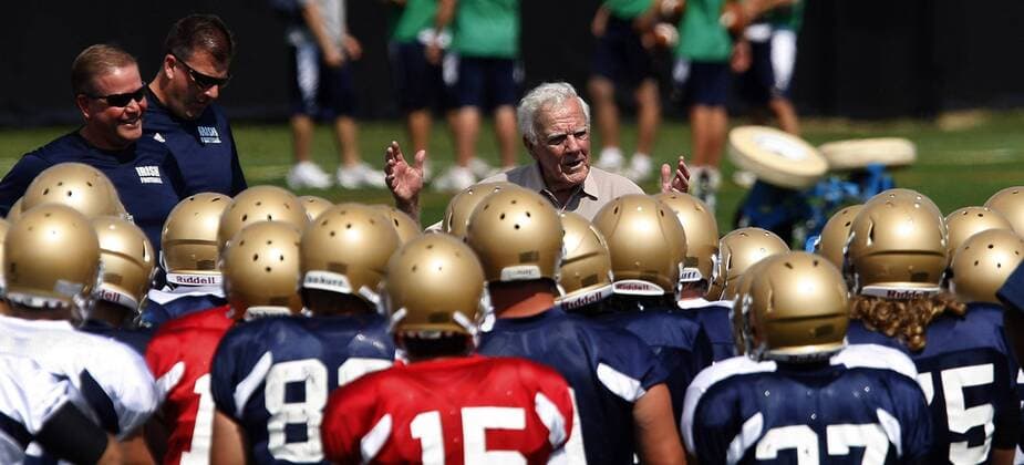 Aug 19, 2010 - South Bend, Indiana, U.S. - University of Notre Dame coaching legend ARA PARSEGHIAN talks to the Fighting Irish football team during practice Thursday. New head coach BRIAN KELLY is at far left. - ZUMAr23