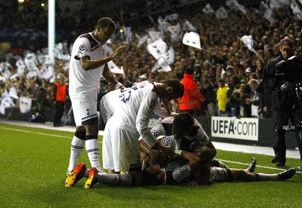 Tottenham Hotspur celebrate their second goal UEFA Champions League Qualifying Tottenham Hotspur (white) v BSC Young Boys Bern - 25th August, 2010 EDITORIAL USE ONLY. No use with unauthorised audio, video, data, fixture lists, club league logos or live services. Online in-match use limited to 120 images, no video emulation. No use in betting, games or single club league player publications.