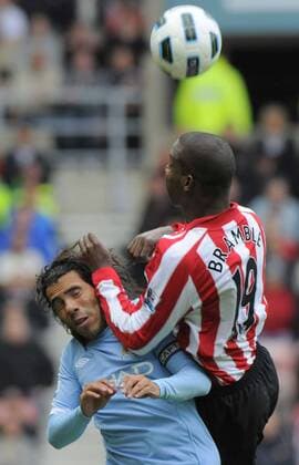Sunderland AFC s Titus Bramble (R) and Manchester City s Carlos Tevez. Barclays Premier League Sunderland FC v Manchester City 29th August, 2010 EDITORIAL USE ONLY. No use with unauthorised audio, video, data, fixture lists, club league logos or live services. Online in-match use limited to 120 images, no video emulation. No use in betting, games or single club league player publications.