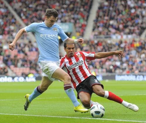 Sunderland AFC s Kieran Richardson (R) and Manchester City s Adam Johnson. Barclays Premier League Sunderland FC v Manchester City 29th August, 2010 EDITORIAL USE ONLY. No use with unauthorised audio, video, data, fixture lists, club league logos or live services. Online in-match use limited to 120 images, no video emulation. No use in betting, games or single club league player publications.