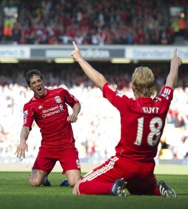Fernando Torres (L) of Liverpool celebrates with Dirk Kuyt of Liverpool Barclays Premier League - Liverpool FC vs. West Bromwich Albion 29th August, 2010 EDITORIAL USE ONLY. No use with unauthorised audio, video, data, fixture lists, club league logos or live services. Online in-match use limited to 120 images, no video emulation. No use in betting, games or single club league player publications.