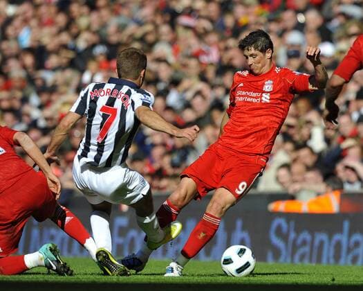 James Morrison (C) of West Bromwich Albion fouls Fernando Torres (R) of Liverpool which leads to his red card Barclays Premier League - Liverpool FC vs. West Bromwich Albion 29th August, 2010 EDITORIAL USE ONLY. No use with unauthorised audio, video, data, fixture lists, club league logos or live services. Online in-match use limited to 120 images, no video emulation. No use in betting, games or single club league player publications.