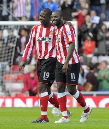 Sunderland s Darren Bent (R) celebrates victory at the final whistle with team mate Titus Bramble. Barclays Premier League - Sunderland vs. Manchester City 29th August, 2010 EDITORIAL USE ONLY. No use with unauthorised audio, video, data, fixture lists, club league logos or live services. Online in-match use limited to 120 images, no video emulation. No use in betting, games or single club league player publications.
