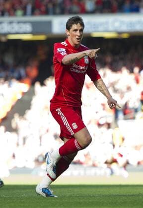 Fernando Torres of Liverpool celebrates scoring the winning goal Barclays Premier League - Liverpool FC vs. West Bromwich Albion 29th August, 2010 EDITORIAL USE ONLY. No use with unauthorised audio, video, data, fixture lists, club league logos or live services. Online in-match use limited to 120 images, no video emulation. No use in betting, games or single club league player publications.