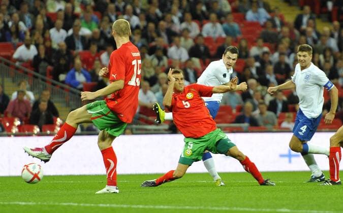 Adam Johnson (2R) of England scores the third goal against Veselin Minev (C) of Bulgaria European Championship Qualifying Group G England v Bulgaria 3rd September, 2010 EDITORIAL USE ONLY. No use with unauthorised audio, video, data, fixture lists, club league logos or live services. Online in-match use limited to 120 images, no video emulation. No use in betting, games or single club league player publications. o0 Tor