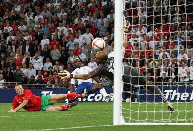 England (white) v Bulgaria (red) . . 03.09.10: Jermain Defoe scores his hat-trick goal for England. 4-0 