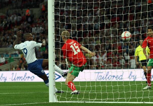 England (white) v Bulgaria (red) . . 03.09.10: Jermain Defoe scores a goal for England. 1-0 