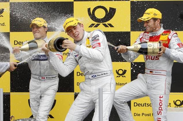 Motorsports DTM: german touring cars championship 2010, 7 Rennen Brands Hatch, England, L-R: 04 Bruno Spengler (CAN, Mercedes-Benz Bank AMG C-Klasse), Sieger 07 Paul di Resta (SCO, AMG Mercedes C-Klasse), 01 Timo Scheider (GER, Audi Team Abt, A4 DTM), xHOCHxZWEIx xJuergenxTapx o0 Sekt Sektdusche Champagner Champagnerdusche