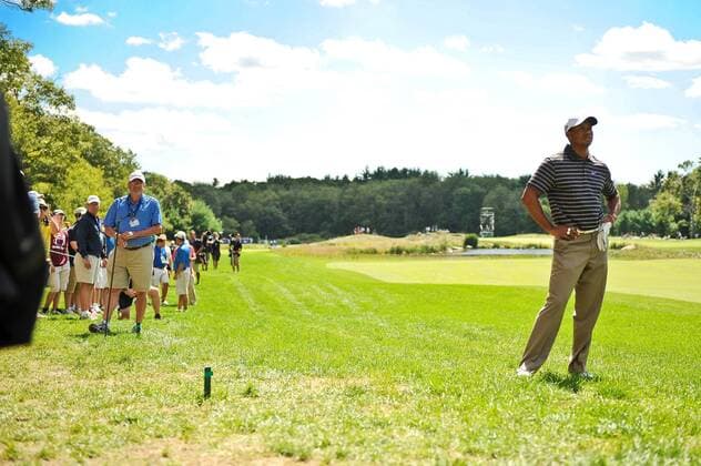 Sep. 05, 2010 - Norton, Massachusetts, United States of America - TIGER WOODS (USA) contemplates his second shot on the 7th hole out of the rough during the third round of the Deutsche Bank Championship at TPC Boston. Woods hit his drive into the gallery. - ZUMAq39