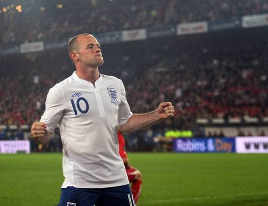 England s Wayne Rooney celebrates scoring his sides opening goal European Championship Qualifying Group G Switzerland v England 7th September, 2010 EDITORIAL USE ONLY. No use with unauthorised audio, video, data, fixture lists, club league logos or live services. Online in-match use limited to 120 images, no video emulation. No use in betting, games or single club league player publications.