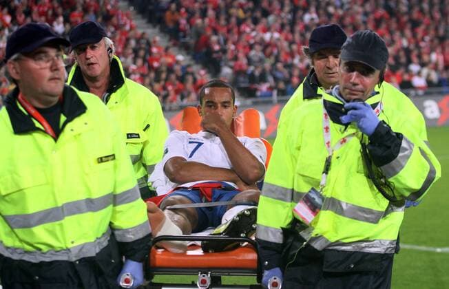 England s Theo Walcott goes off injured European Championship Qualifying Group G Switzerland v England 7th September, 2010 EDITORIAL USE ONLY. No use with unauthorised audio, video, data, fixture lists, club league logos or live services. Online in-match use limited to 120 images, no video emulation. No use in betting, games or single club league player publications.