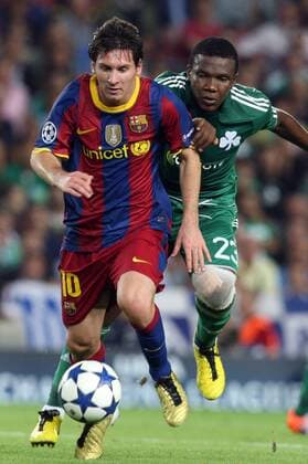 14.09.2010, Barcelona - UEFA Champions League 2010 2011 - FC Barcelona (red stripes) vs Panathinaikos Athens (green) 5:1 --- Lionel Messi and Panathinaikos Simao 