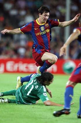 14.09.2010, Barcelona - UEFA Champions League 2010 2011 - FC Barcelona (red stripes) vs Panathinaikos Athens (green) 5:1 --- Lionel Messi of Barca and Panathinaikos Sebastian Leto 