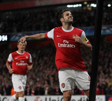 Arsenal s Cesc Fabregas celebrates --- UEFA Champions League - Group H - FC Arsenal London (red) vs SC Sporting Braga (black), 15th September, 2010 EDITORIAL USE ONLY. No use with unauthorised audio, video, data, fixture lists, club league logos or live services. Online in-match use limited to 120 images, no video emulation. No use in betting, games or single club league player publications. o0 Jubel Freude Einzelbild