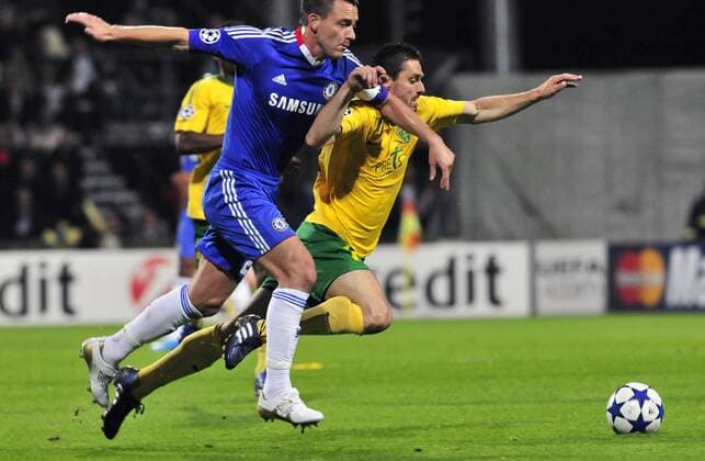 Chelsea FC London s John Terry (left) fights for the ball with Zilina s Tomas Oravec during the Champions League Group F soccer match between MSK Zilina and Chelsea FC London in Zilina, Slovakia, on Wednesday, Sept. 15, 2010. (CTKxPhoto JaroslavxPodhorsky)  CTKPhoto1201009150975401