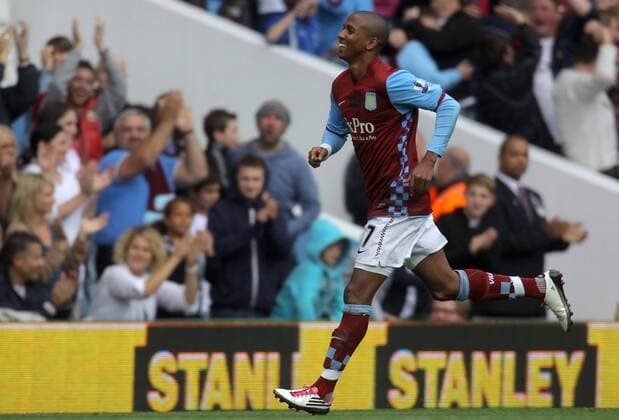 Ashley Young (Villa) celebrates his goal direct from a free-kick Barclays Premier League Aston Villa v Bolton Wanderers 18th September, 2010 EDITORIAL USE ONLY. No use with unauthorised audio, video, data, fixture lists, club league logos or live services. Online in-match use limited to 120 images, no video emulation. No use in betting, games or single club league player publications.