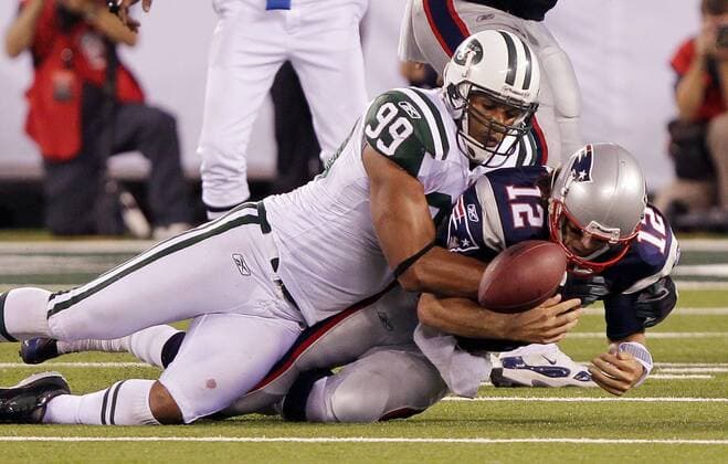 New York Jets Jayson Taylor forces a fumble and sacks New England Patriots Tom Brady in week 2 of the NFL season at New Meadowlands Stadium in East Rutherford, New Jersey on September 19, 2010. The Jets defeated the Patriots 28-14.  NYP20100919119