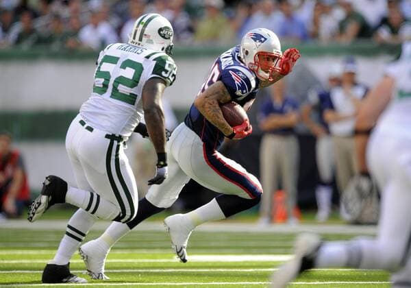 19 September 2010: New England Patriots tight end Aaron Hernandez (85) gets chased by New York Jets linebacker David Harris (52) during the first half the New England Patriots vs New York Jets game at the New Meadowlands Stadium in East Rutherford, New Jersey Icon781100919018 EDITORIAL USE ONLY