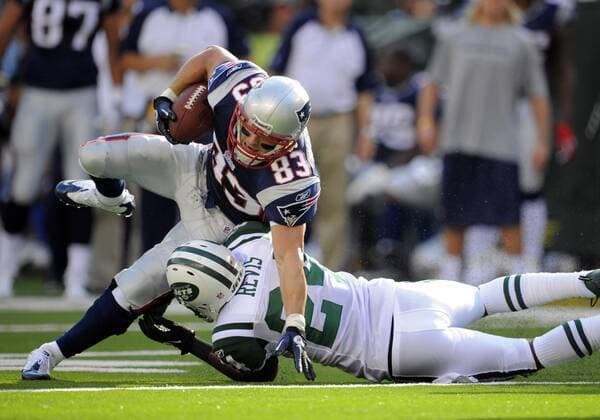 19 September 2010: New England Patriots wide receiver Wes Welker (83) tries to break free from New York Jets cornerback Darrelle Revis (24) during the first half the New England Patriots vs New York Jets game at the New Meadowlands Stadium in East Rutherford, New Jersey Icon781100919026 EDITORIAL USE ONLY