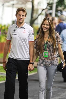 Sept. 23, 2010 - Singapore - JENSON BUTTON (GBR) McLaren with JESSICA MICHIBATA (JPN). ..Formula One World Championship, Rd 15, Singapore Grand Prix, Preparations, Marina Bay Street Circuit.  - ZUMAorl o0 Fahrerfrau, Frau Familie privat